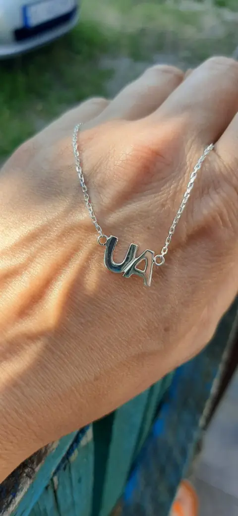 "UA"