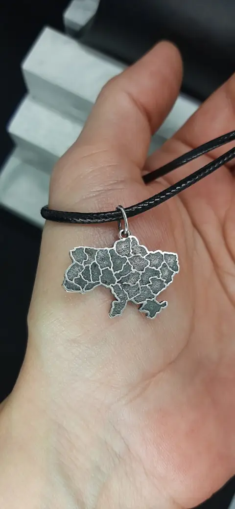 Україна
