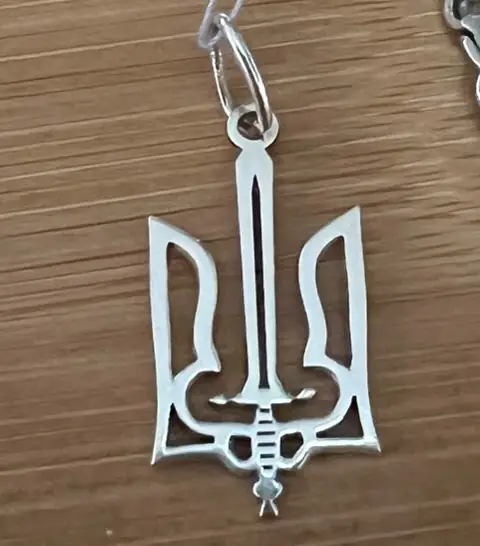 Тризуб з мечем