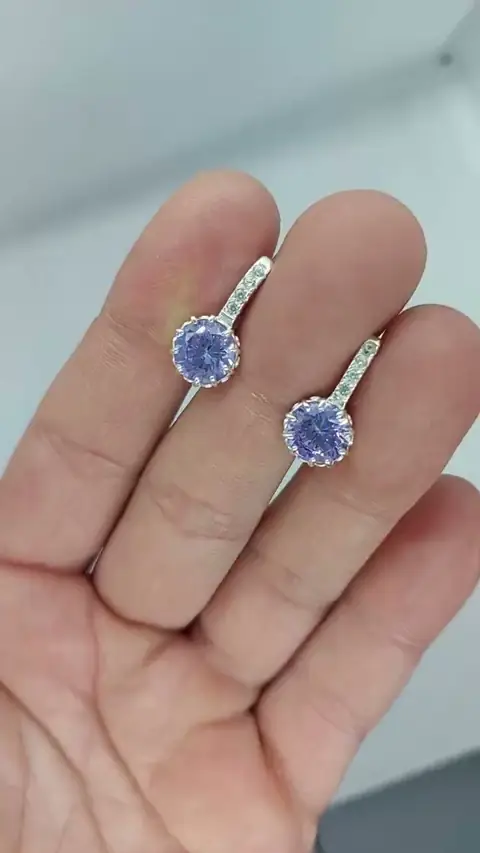 Сережки з блакитними камінцями